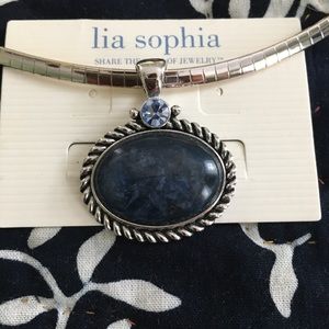 A unique necklace that is both silver and gold.